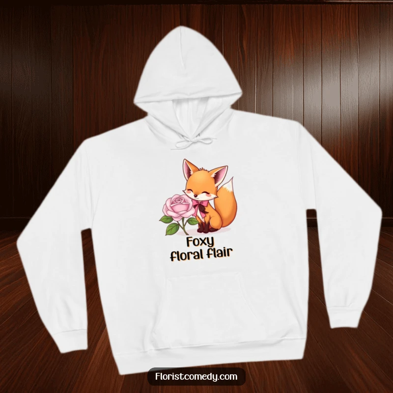 Funny fox hoodie featuring a playful fox tying a ribbon around a rose, perfect for cozy days and adding funny floral flair.